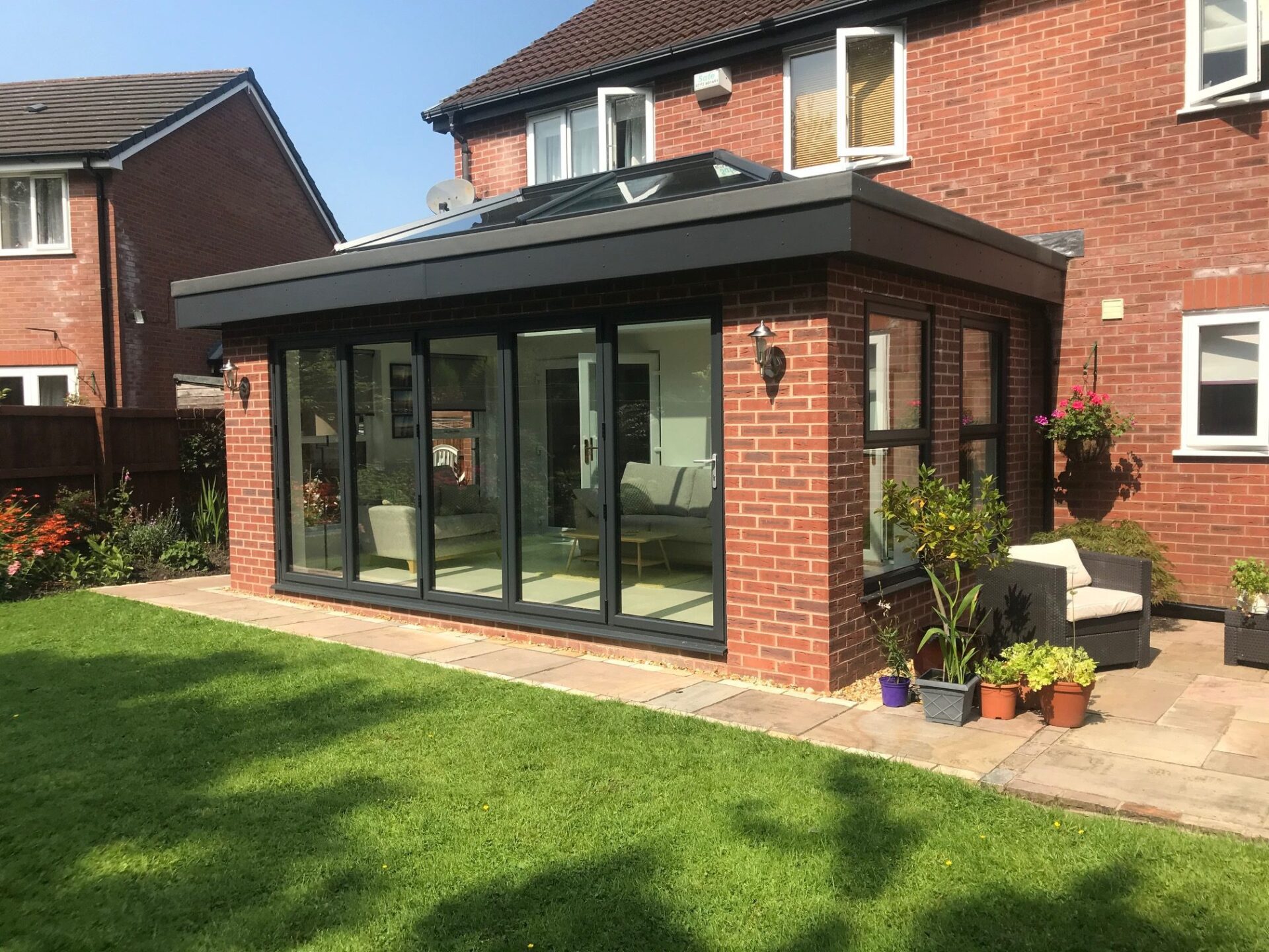 orangery with bi folding doors rotated.jpg